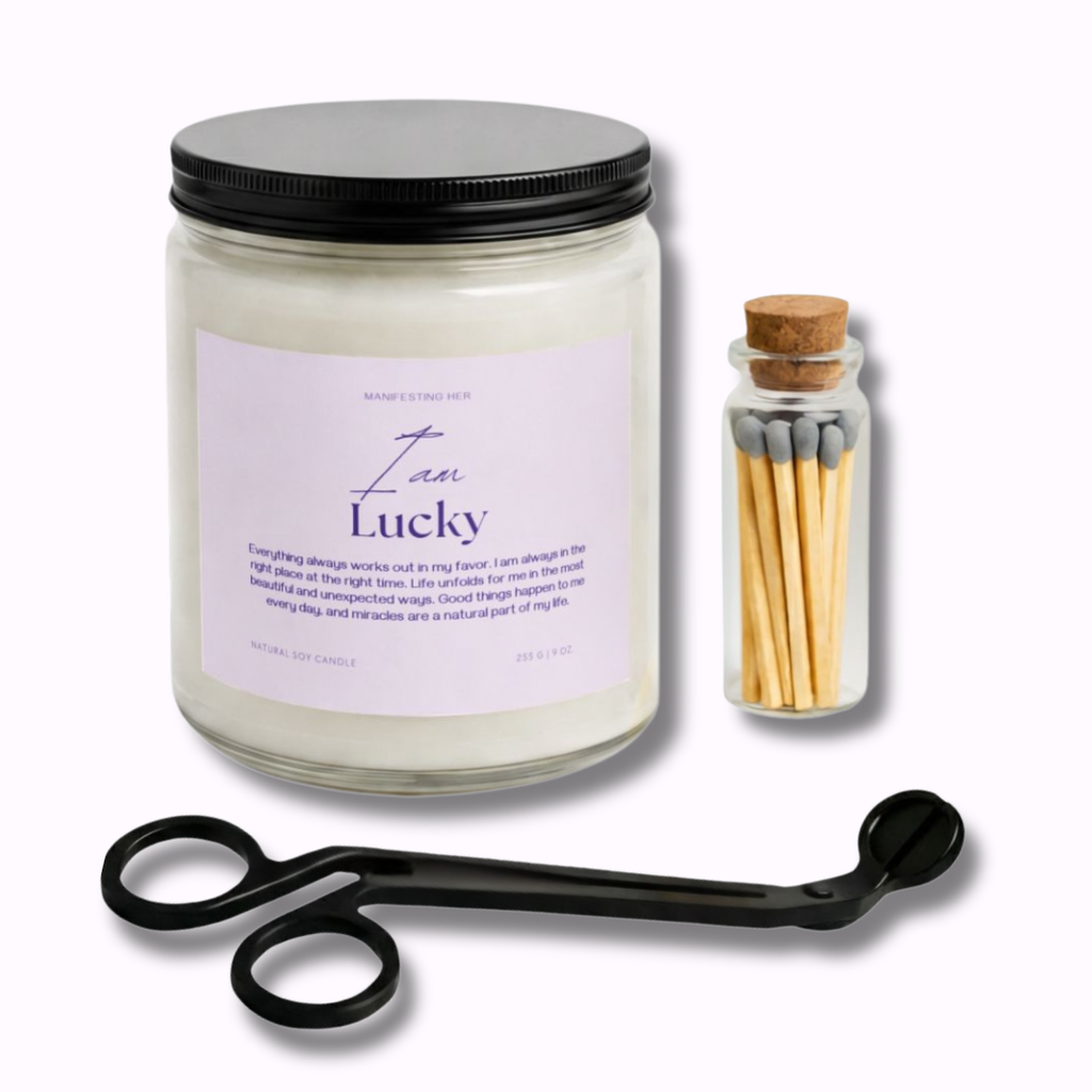 Candle jar with 'Law of Lucky' label, matches, and candle snuffer on a white background